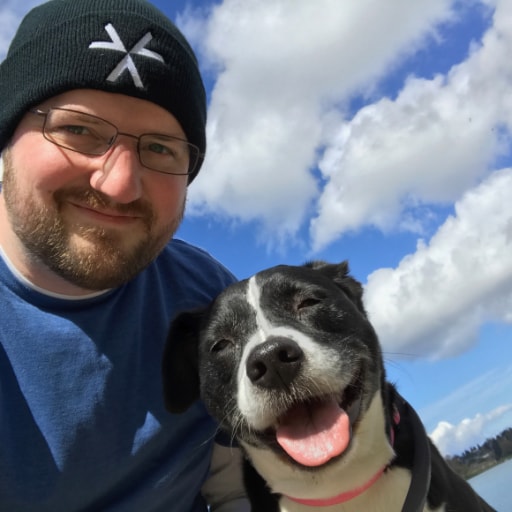 a human and a dog that look like Human and Dog.